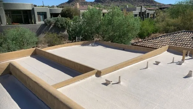 Spray foam roof on a Scottsdale, Arizona home baking under intense desert sun